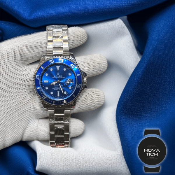 Rolex Submariner featuring a blue dial and bezel, and a silver-colored